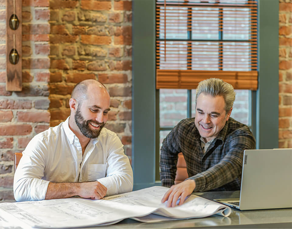 Chris Gayler & Brett Hunnicutt at plans